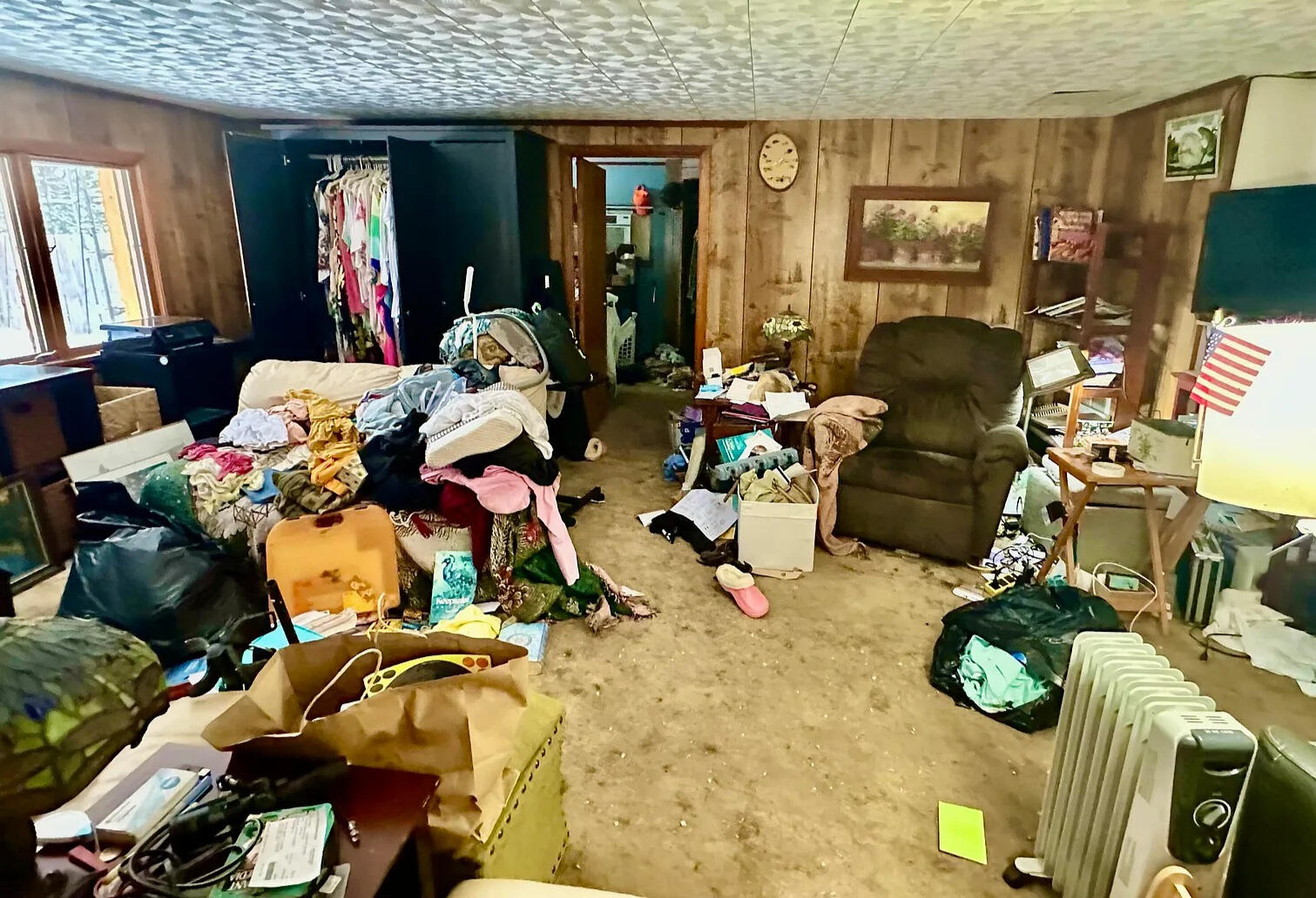 before image: living room clutter real estate virtual staging and decluttering